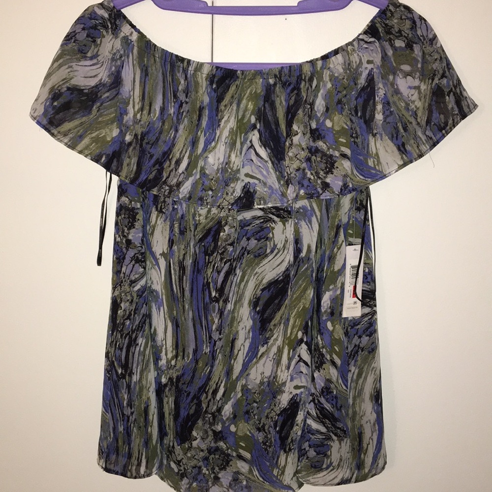 NWT! Dressy top. Can be worn off the shoulders.